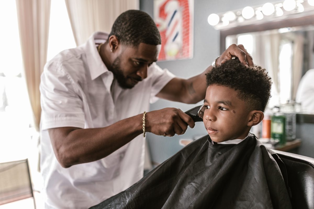Clipper cut detail hairstyle shown on a boy under 12.