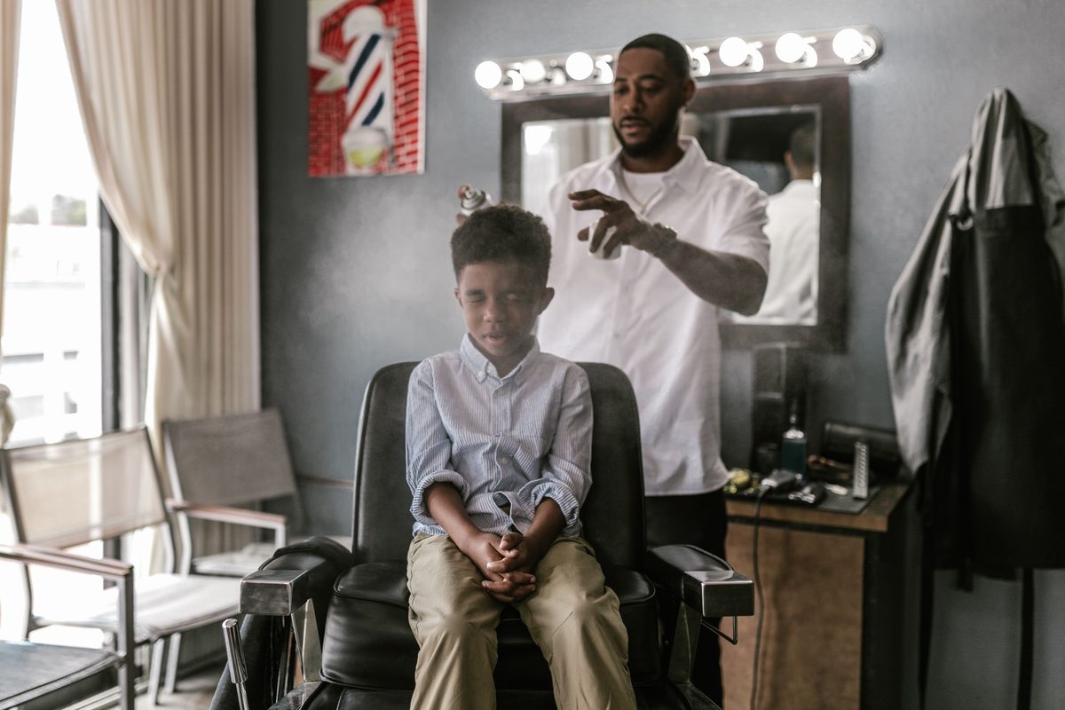 Contemporary salon cut hairstyle shown on a boy under 12.
