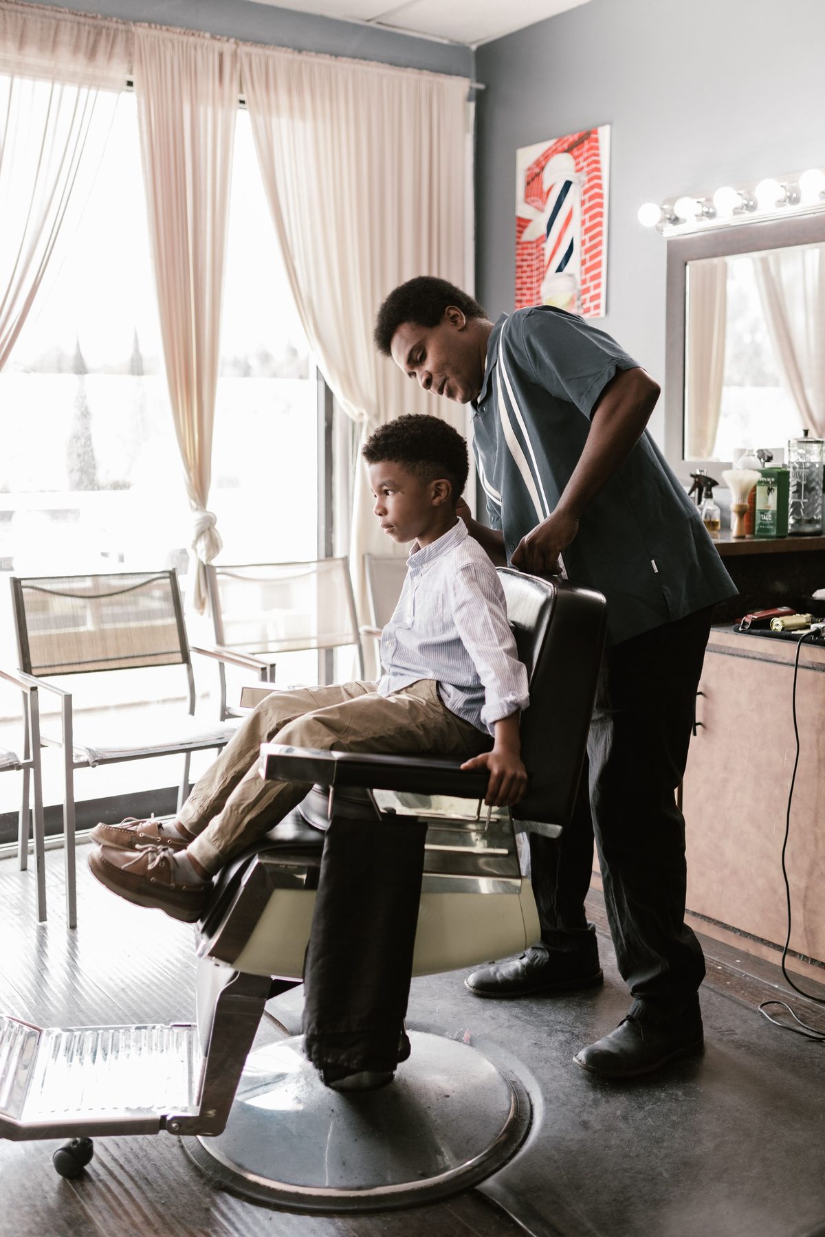 Modern grooming cut hairstyle shown on a boy under 12.