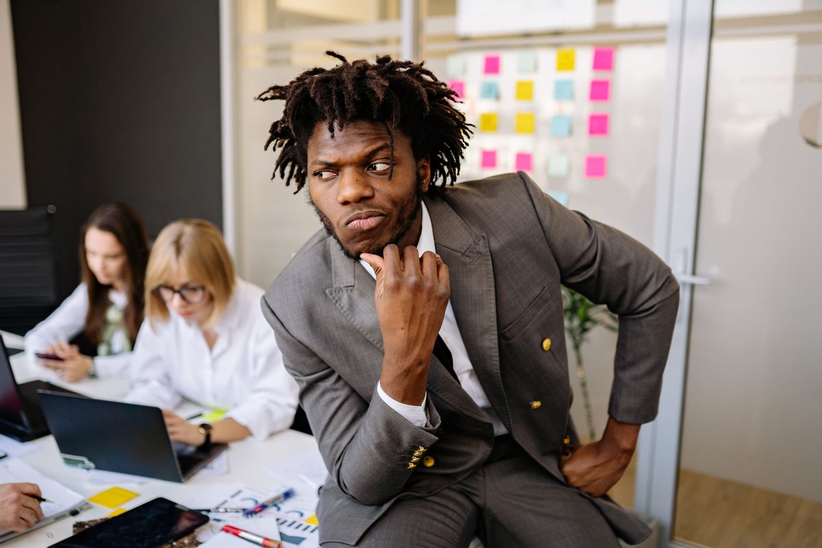 Thoughtful businessman hairstyle shown on a professional man.