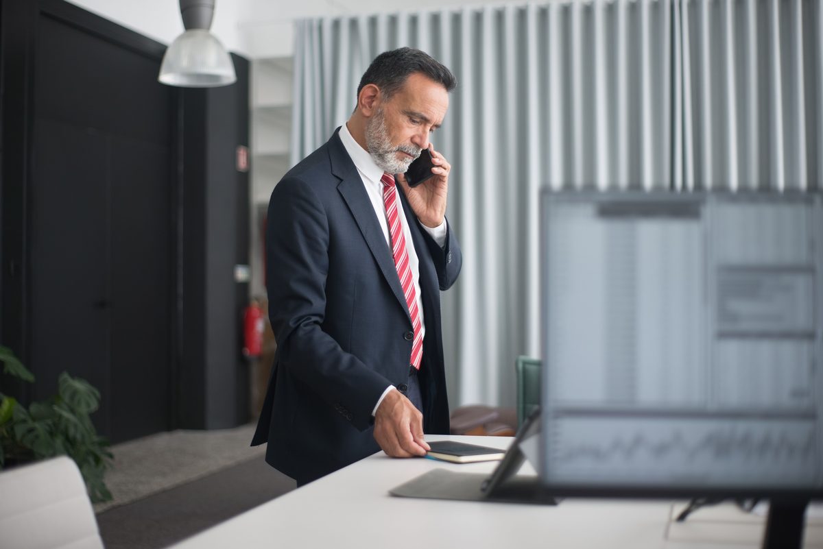 Office phone call hairstyle shown on a professional man.