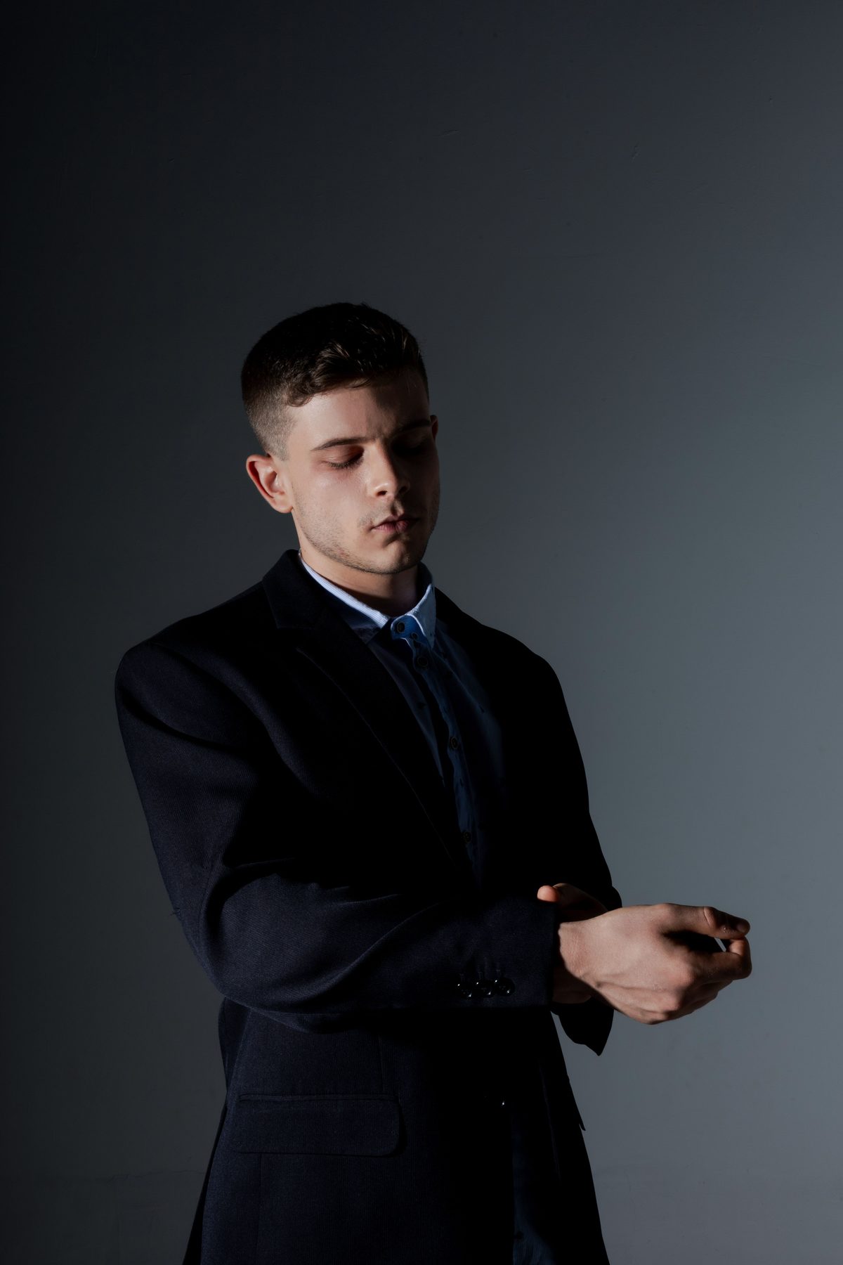 Formal elegant portrait hairstyle shown on a professional man.