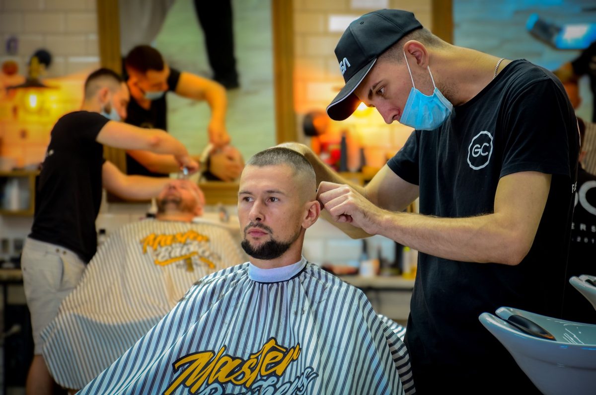 Contemporary Precision Cut hairstyle shown on a professional man.