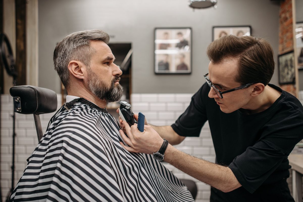 Beard-Blend Precision Trim hairstyle shown on a professional man.