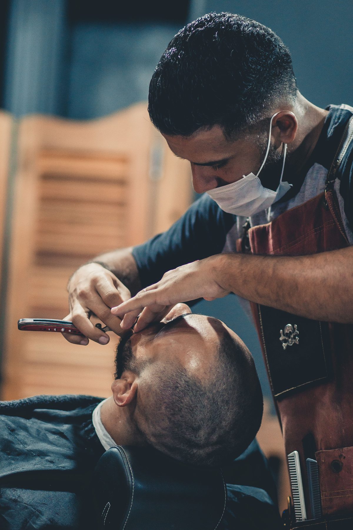Straight-Razor Finish hairstyle shown on a professional man.