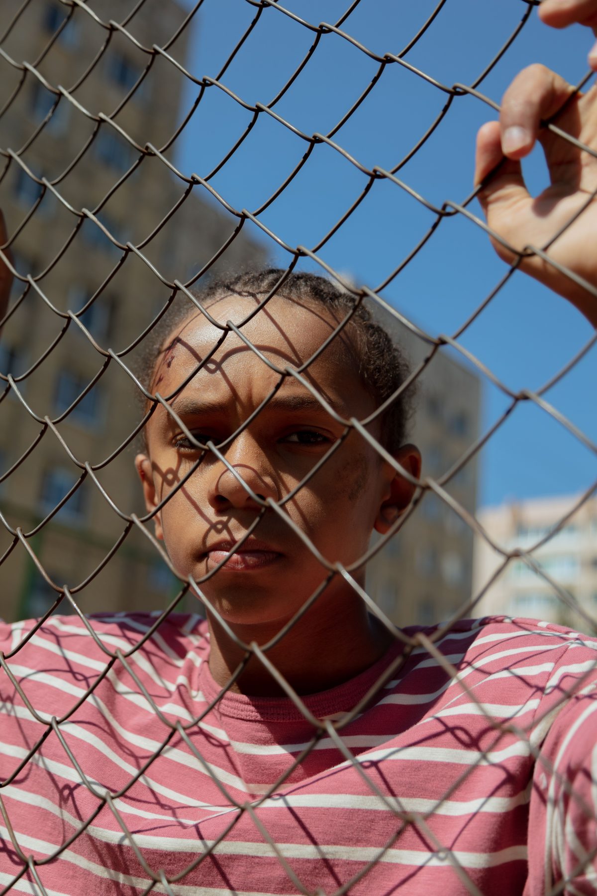 Urban high-school vibe hairstyle shown on a teenager.
