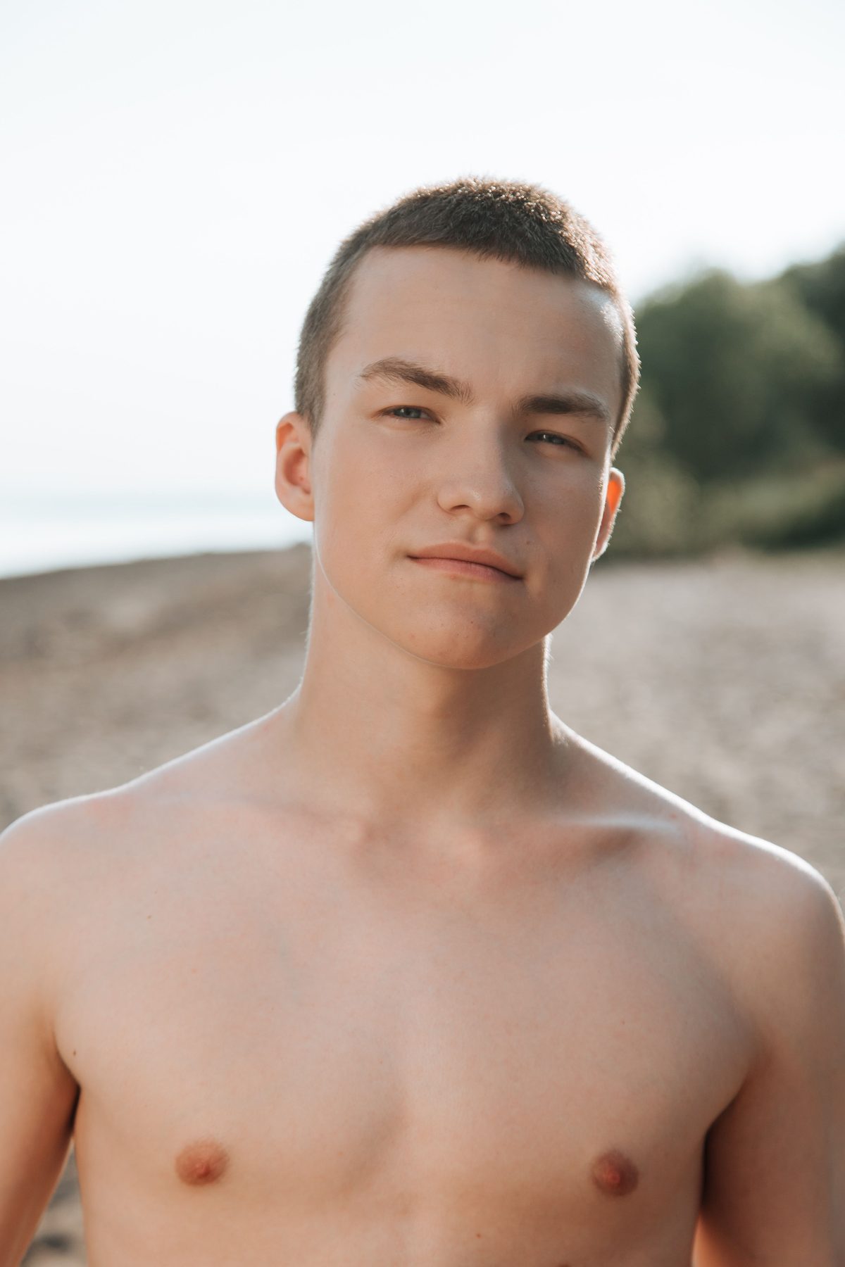 Beachy casual cut hairstyle shown on a teenager.