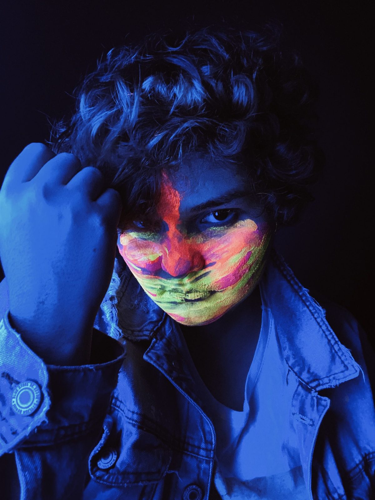 Neon-lit Gen-Z hairstyle shown on a teenager.
