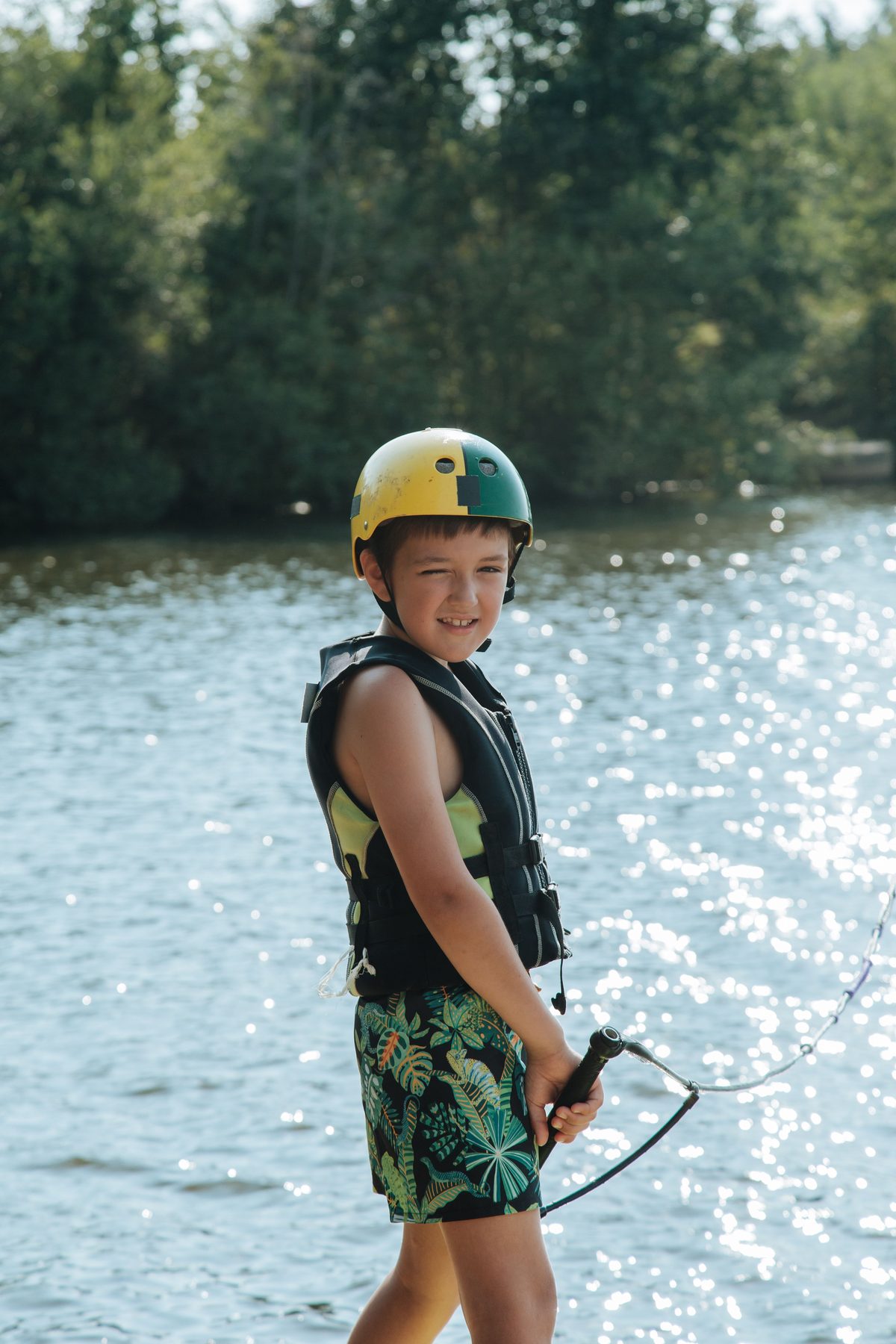 Sporty young wakeboarder hairstyle shown on a teenager.