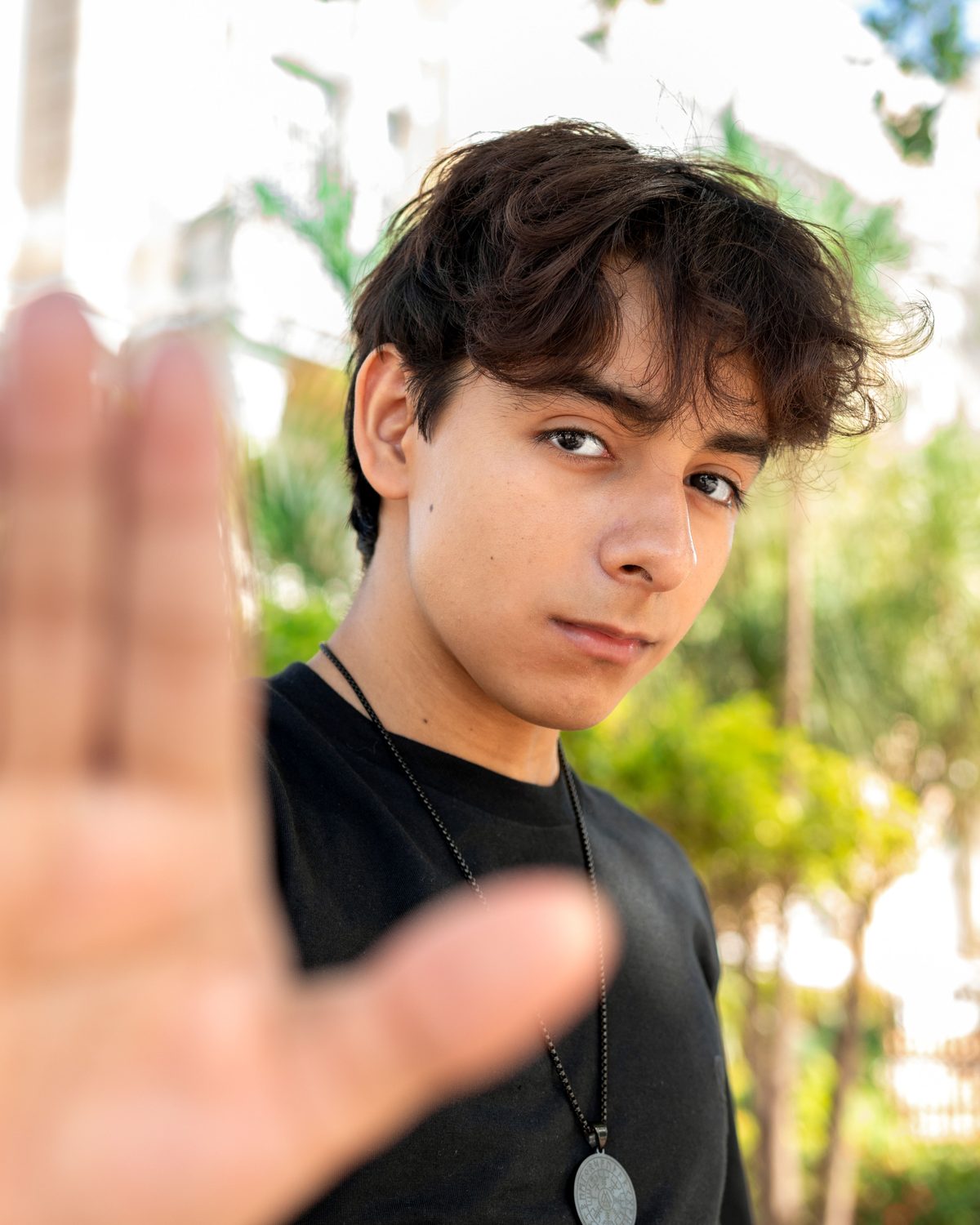 Handsome urban teen hairstyle shown on a teenager.