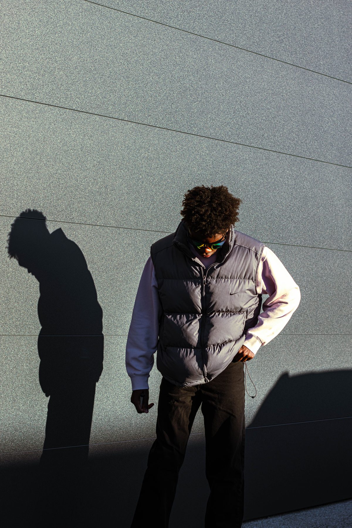 Afro urban fashion hairstyle shown on a young man.