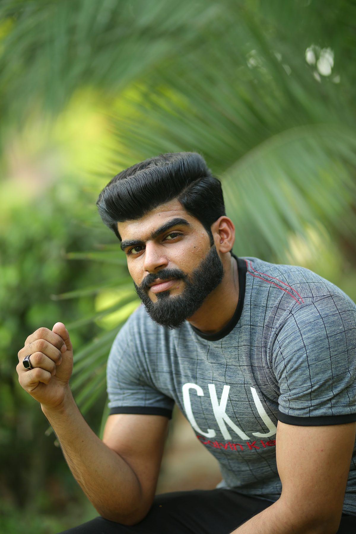 Sharp beard blend hairstyle shown on a young man.