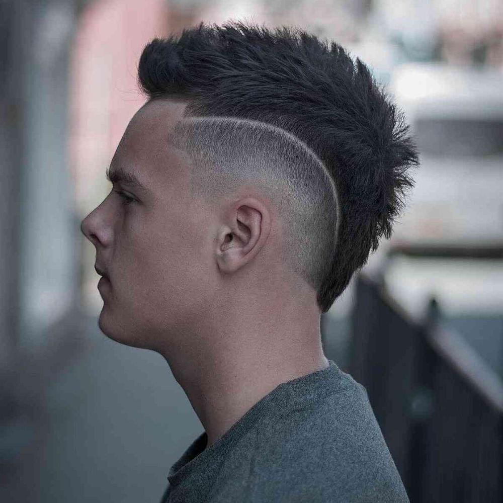 Mid Burst Fade haircut reference showing defined curl finish