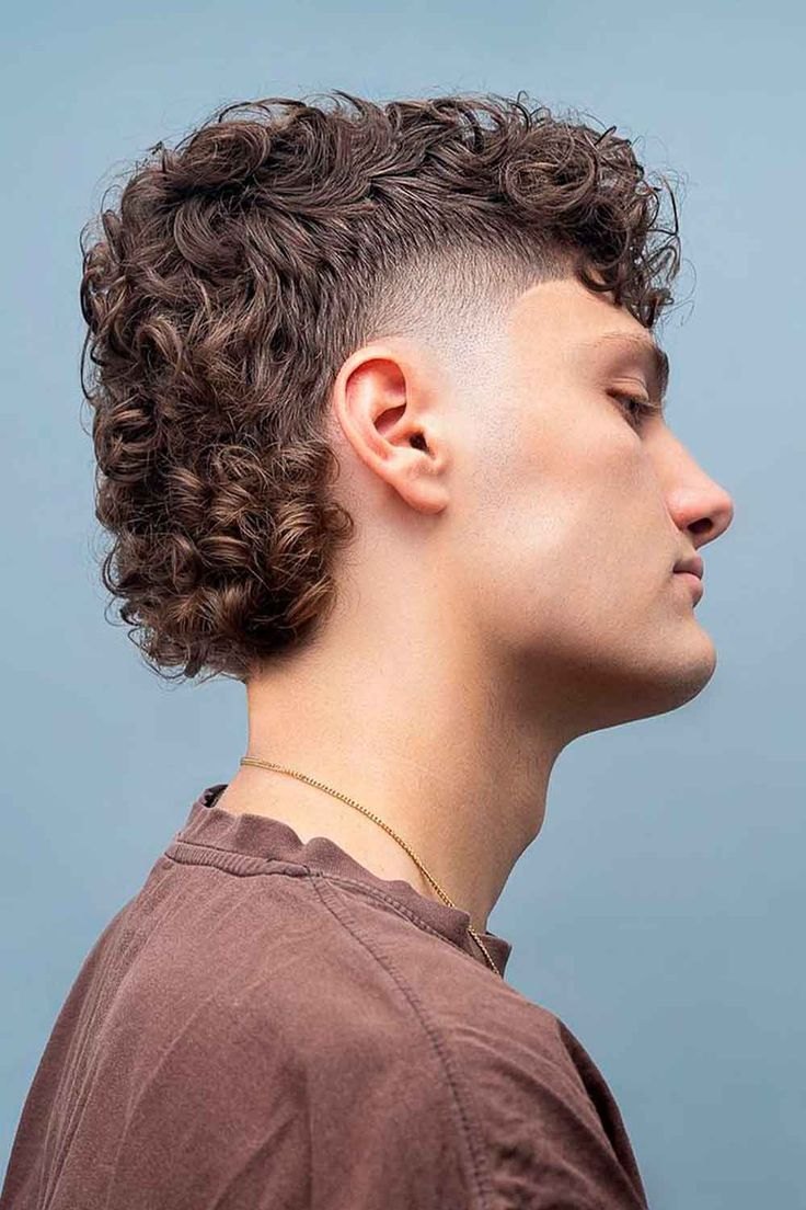 Low Burst Fade haircut reference showing disconnected statement
