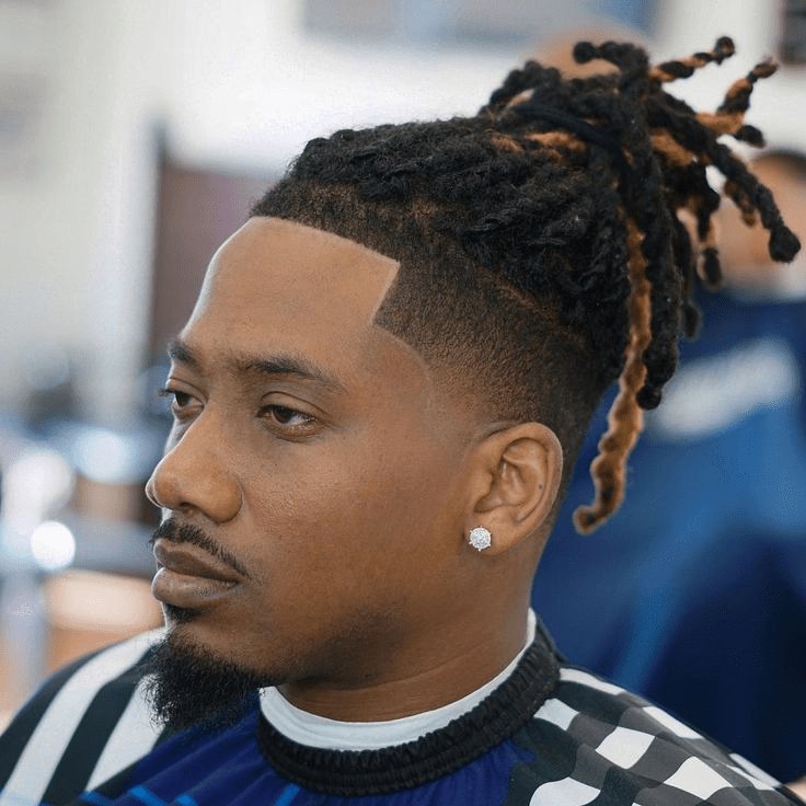 Mid Burst Fade haircut reference showing disconnected statement