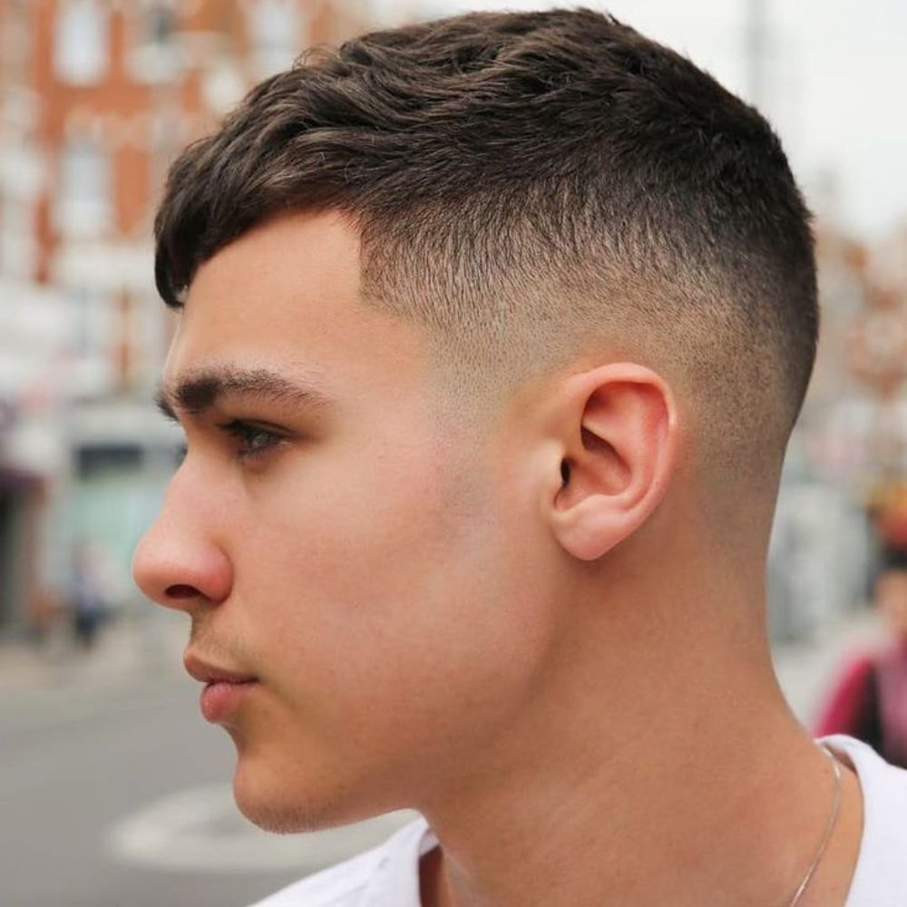 Essential Burst Fade haircut reference showing the low-profile arc