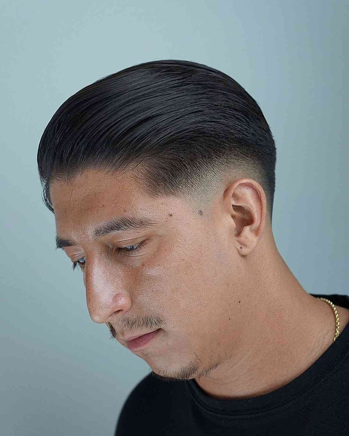 Essential Burst Fade haircut reference showing textured forward top