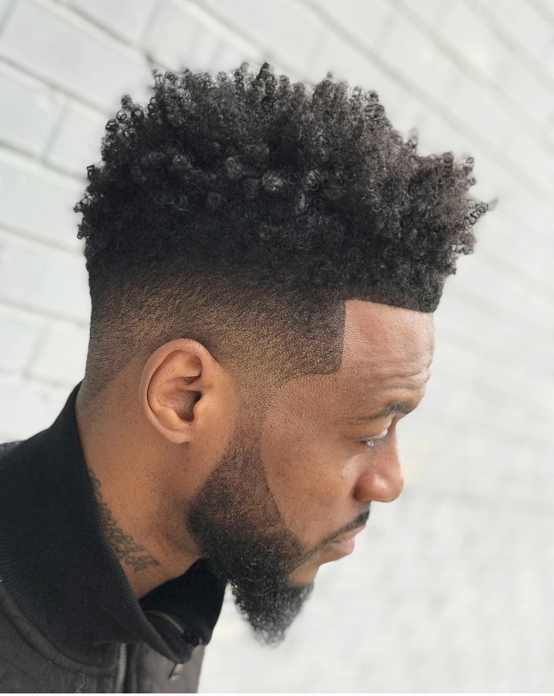 Low Burst Fade haircut reference showing the clean mid burst