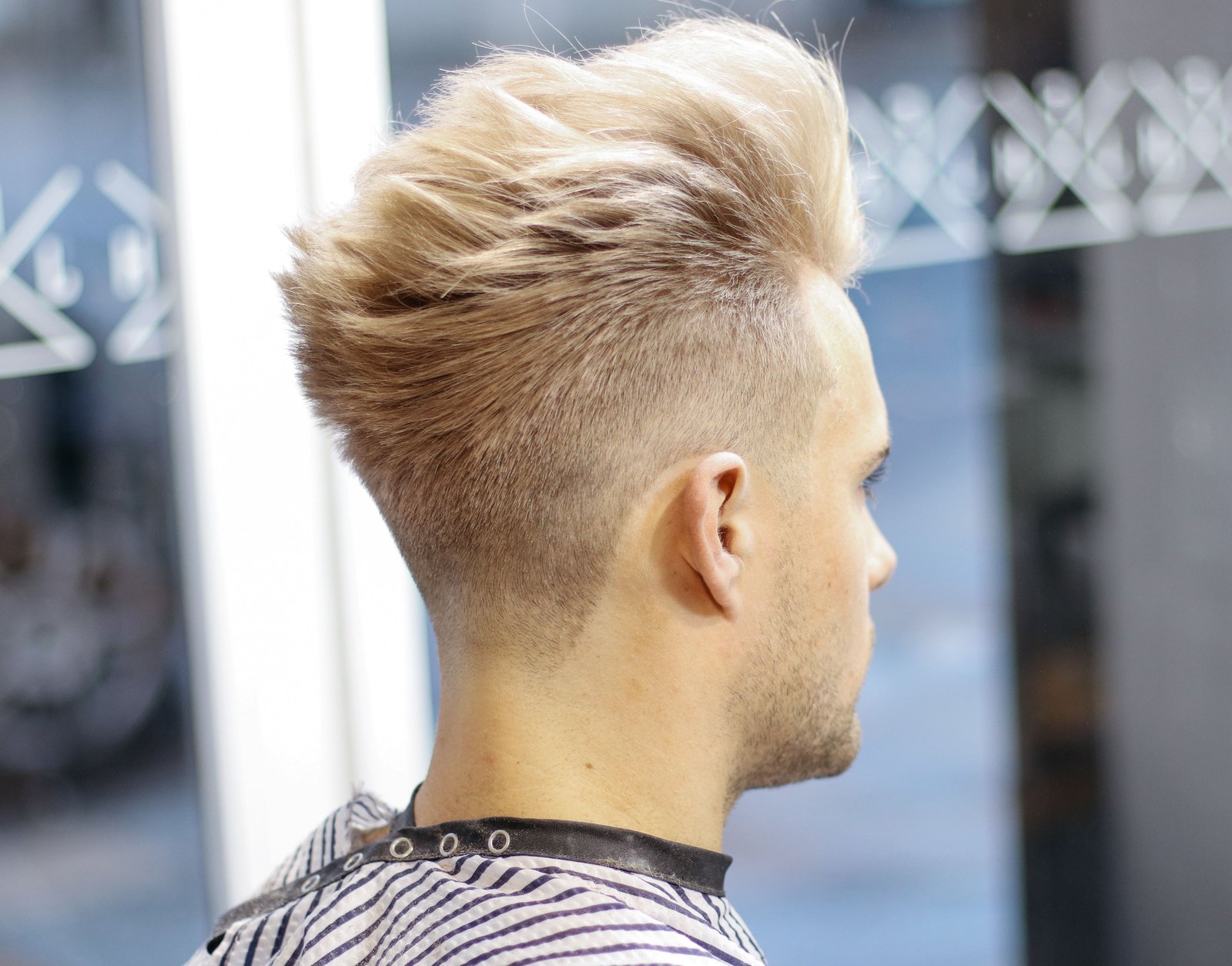Essential Burst Fade haircut reference showing loose natural movement