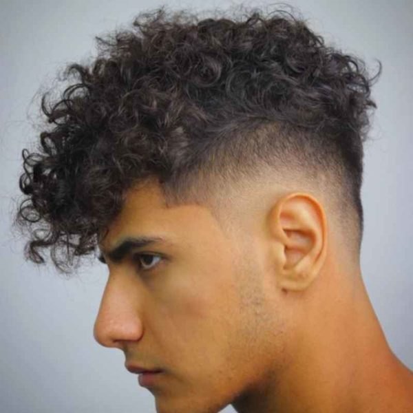 Low Burst Fade haircut reference showing the low-profile arc