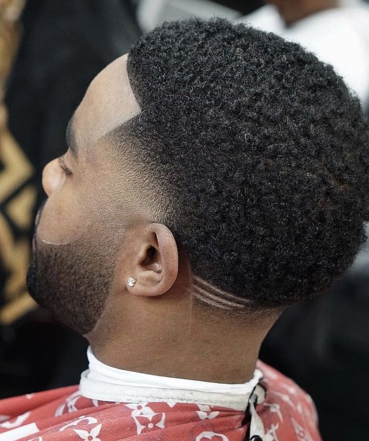 Low Burst Fade haircut reference showing the clean mid burst