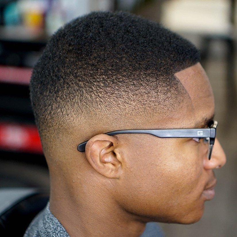 Low Burst Fade haircut reference showing the high-contrast version