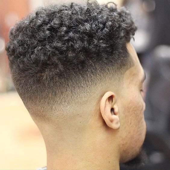 Low Burst Fade haircut reference showing the high-contrast version