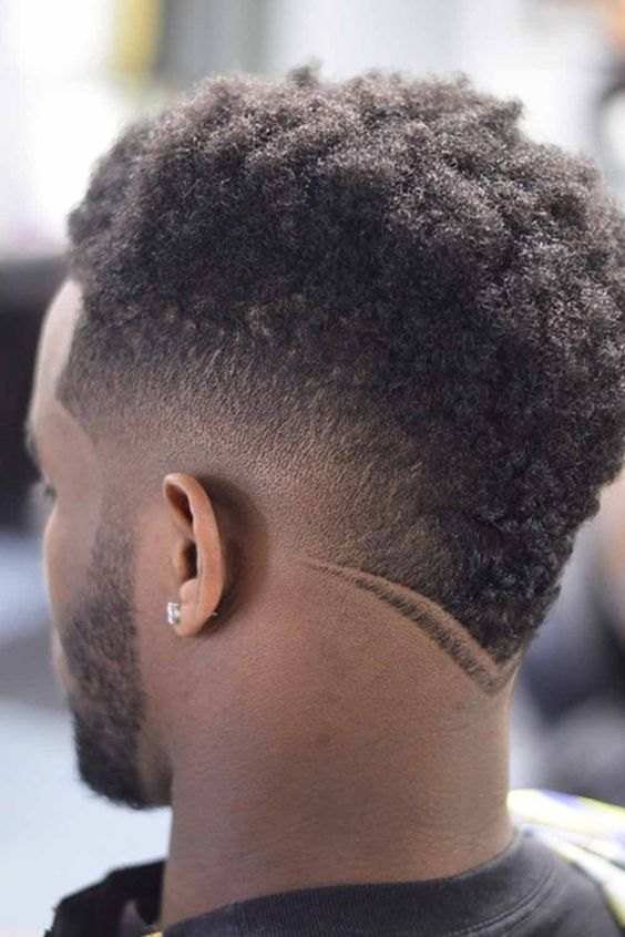 Essential Burst Fade haircut reference showing defined curl finish