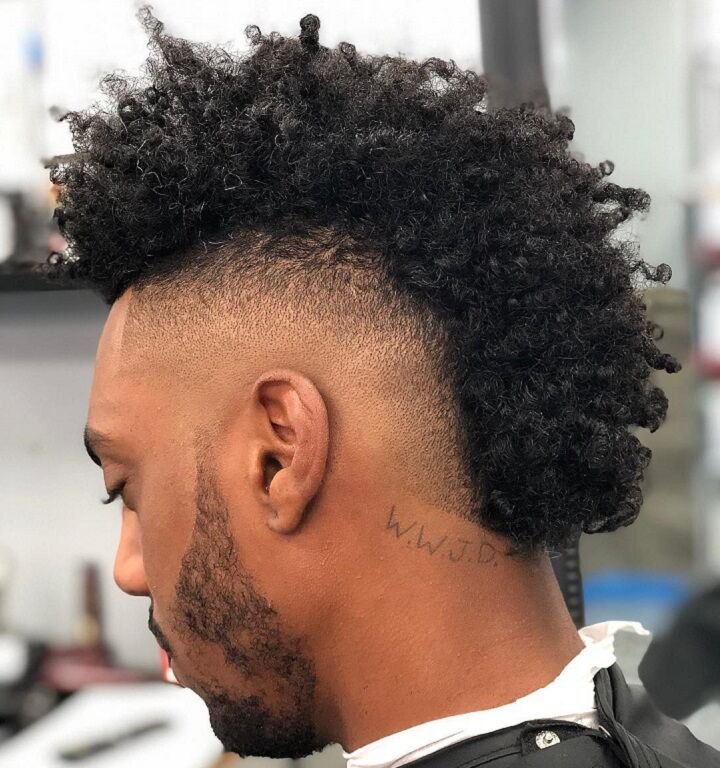 Low Burst Fade haircut reference showing loose natural movement