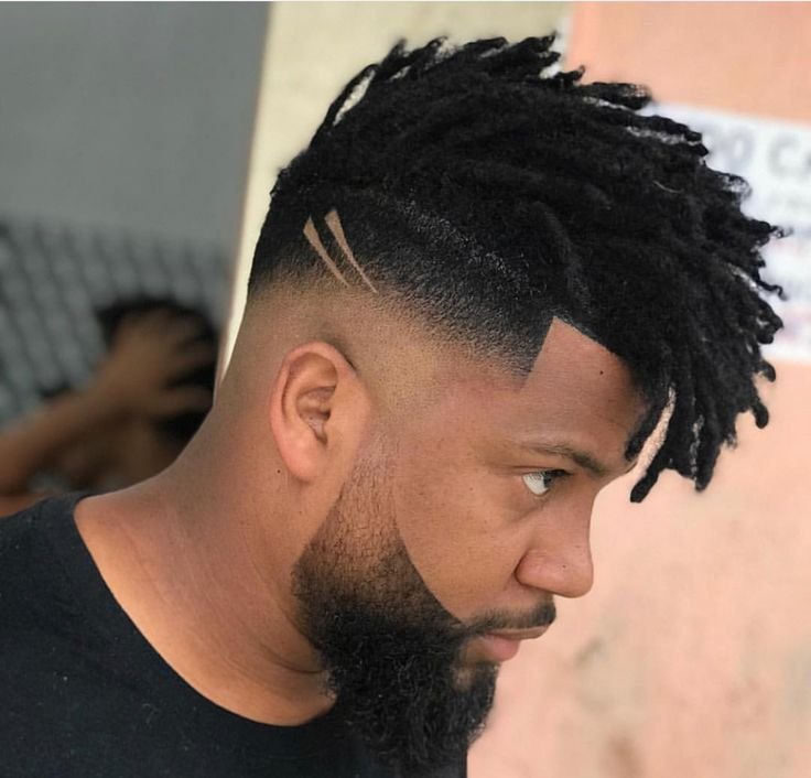 Low Burst Fade haircut reference showing compact crop