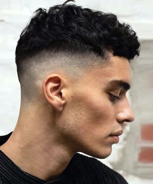 Low Burst Fade haircut reference showing disconnected statement