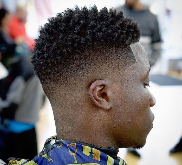 Natural coils preserved above a controlled ear-level transition.