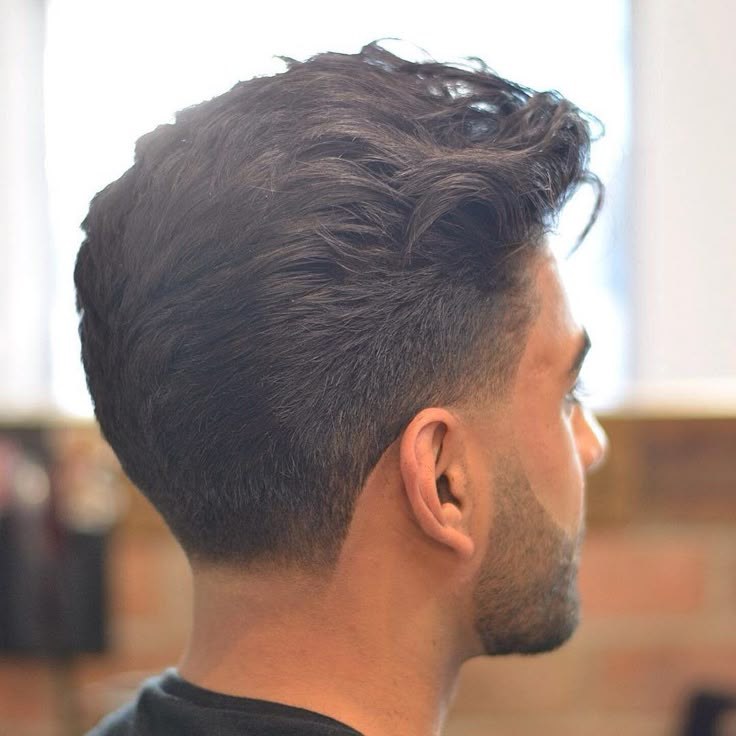Side-back angle with a narrow transition and natural crown weight.
