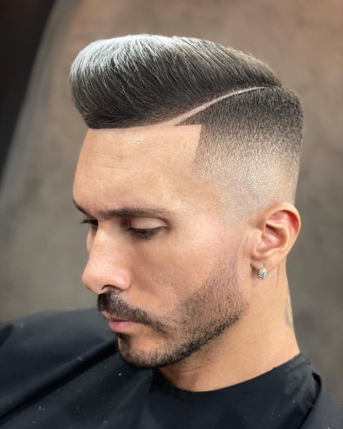 Curly Burst Fade haircut reference showing compact crop