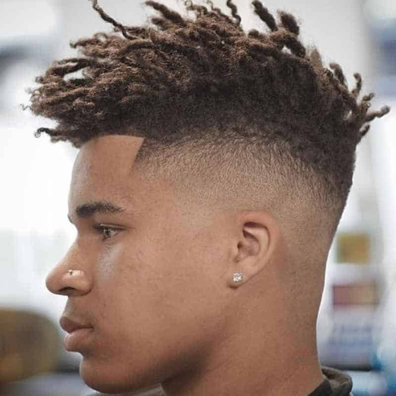 Low Burst Fade haircut reference showing disconnected statement