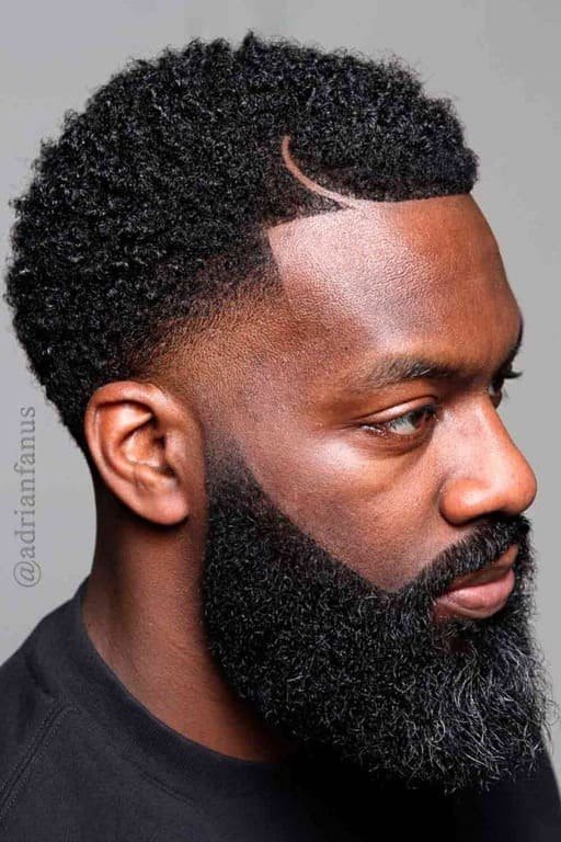 Faux Hawk Burst Fade haircut reference showing the high-contrast version