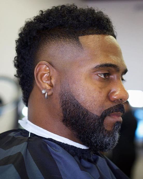 Curly Burst Fade haircut reference showing the clean mid burst