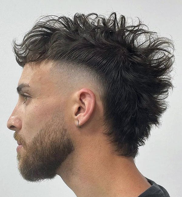Coily Burst Fade haircut reference showing the low-profile arc