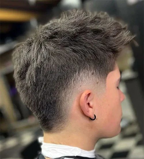 Mid Burst Fade haircut reference showing the low-profile arc