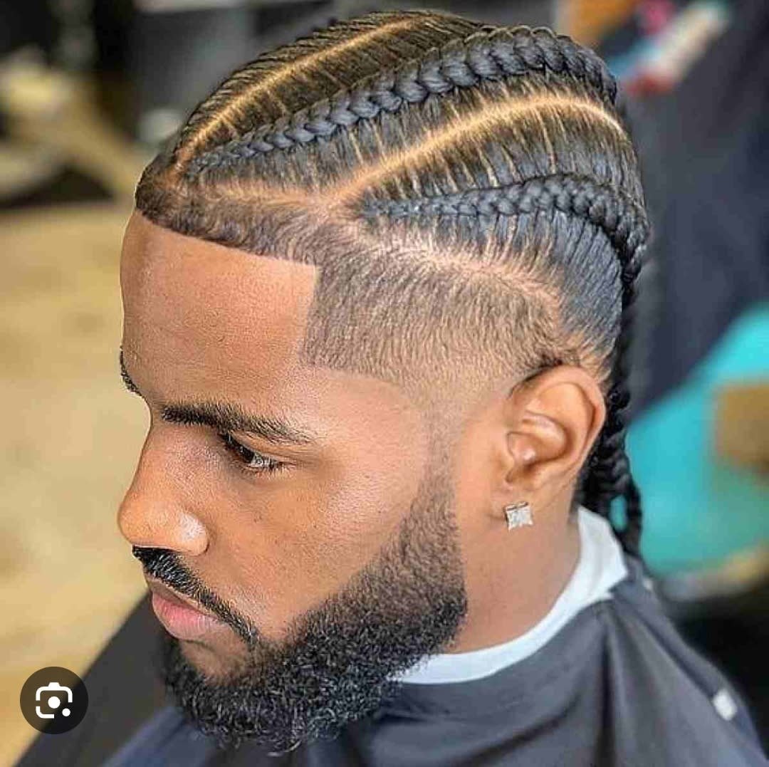 Curly Burst Fade haircut reference showing textured forward top
