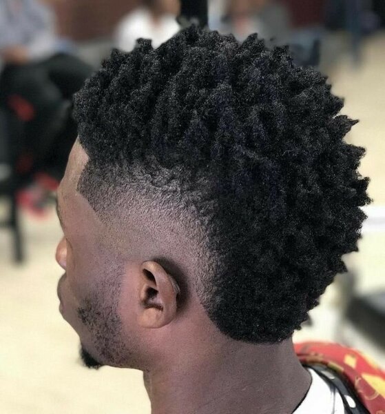 Coily Burst Fade haircut reference showing the clean mid burst